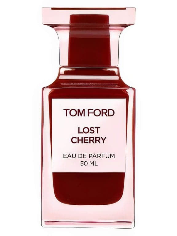 Tom Ford Lost Cherry perfume bottle – blurred decorative background