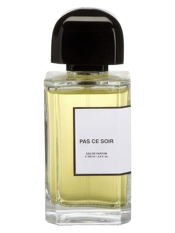 BDK Parfums Pas Ce Soir perfume bottle – blurred decorative background
