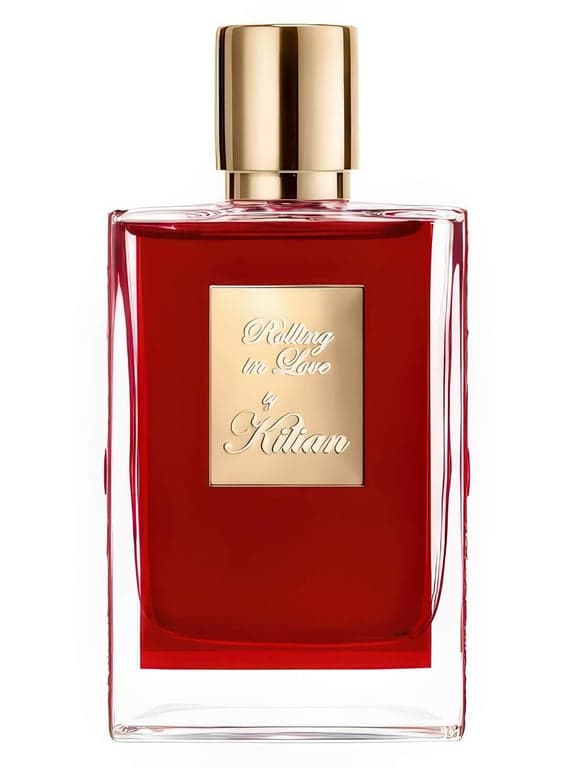 By Kilian Rolling in Love perfume bottle – blurred decorative background