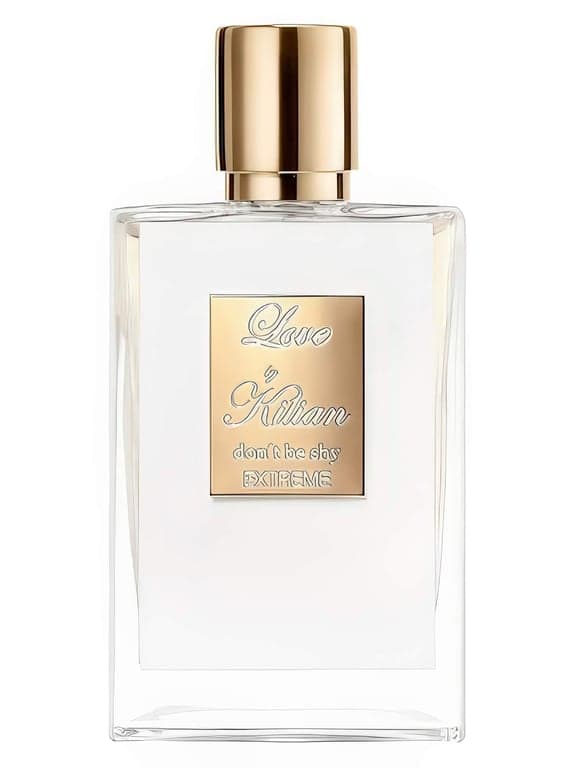 By Kilian Love Don't Be Shy Extreme perfume bottle – blurred decorative background