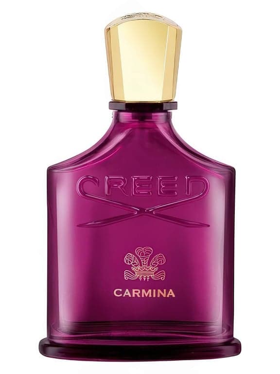 Creed Carmina perfume bottle – blurred decorative background