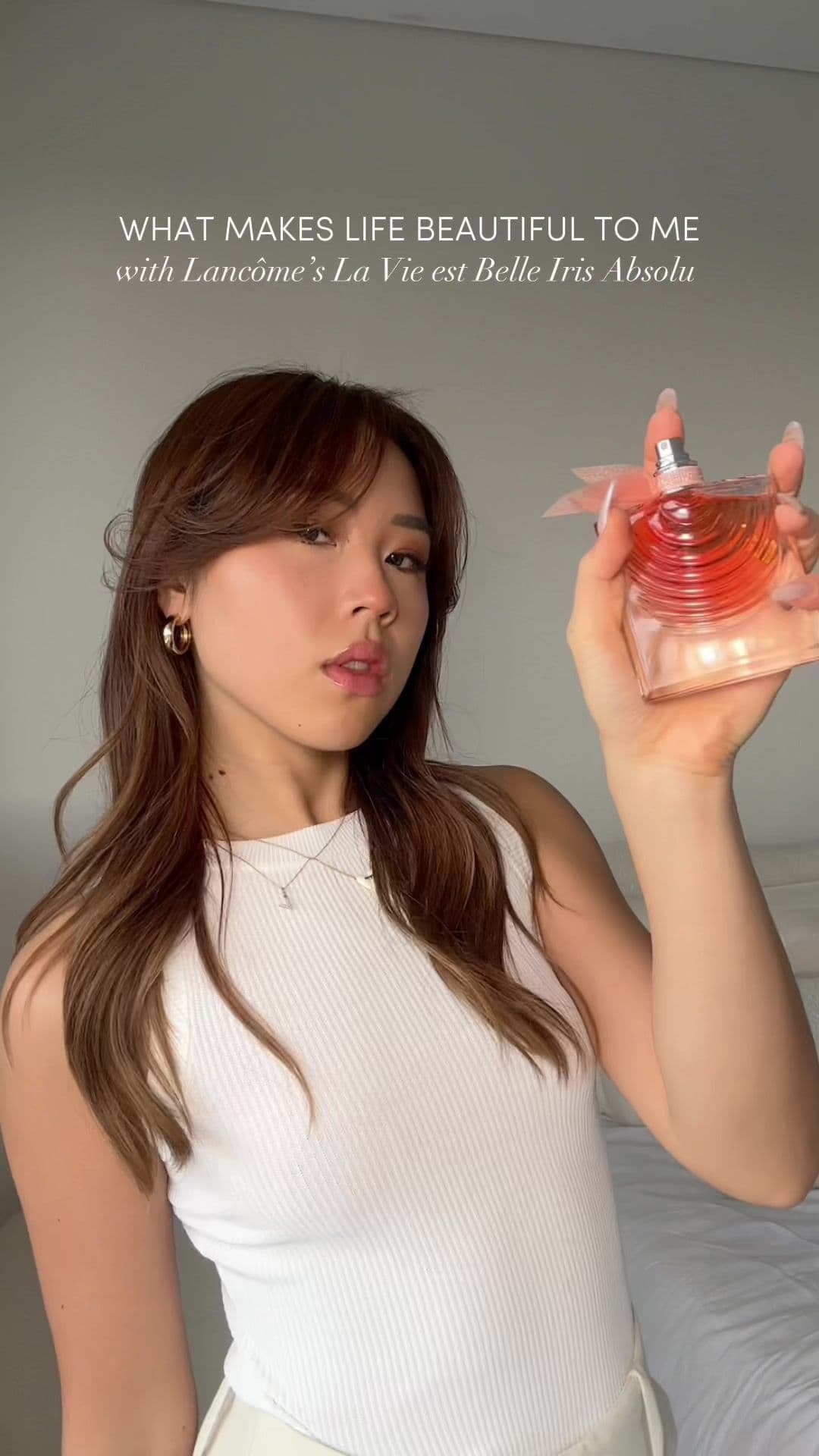 A warm floral hug in a bottle 🌸 Celebrating what makes life beautiful with @lancome.official’s La Vie est Belle Iris Absolu — a vibrant, all-encompassing scent that makes me reminisce the most joyful moments in life 🤍✨  #LaVieEstBelle #MakeLifeBeautiful #LancomeAU