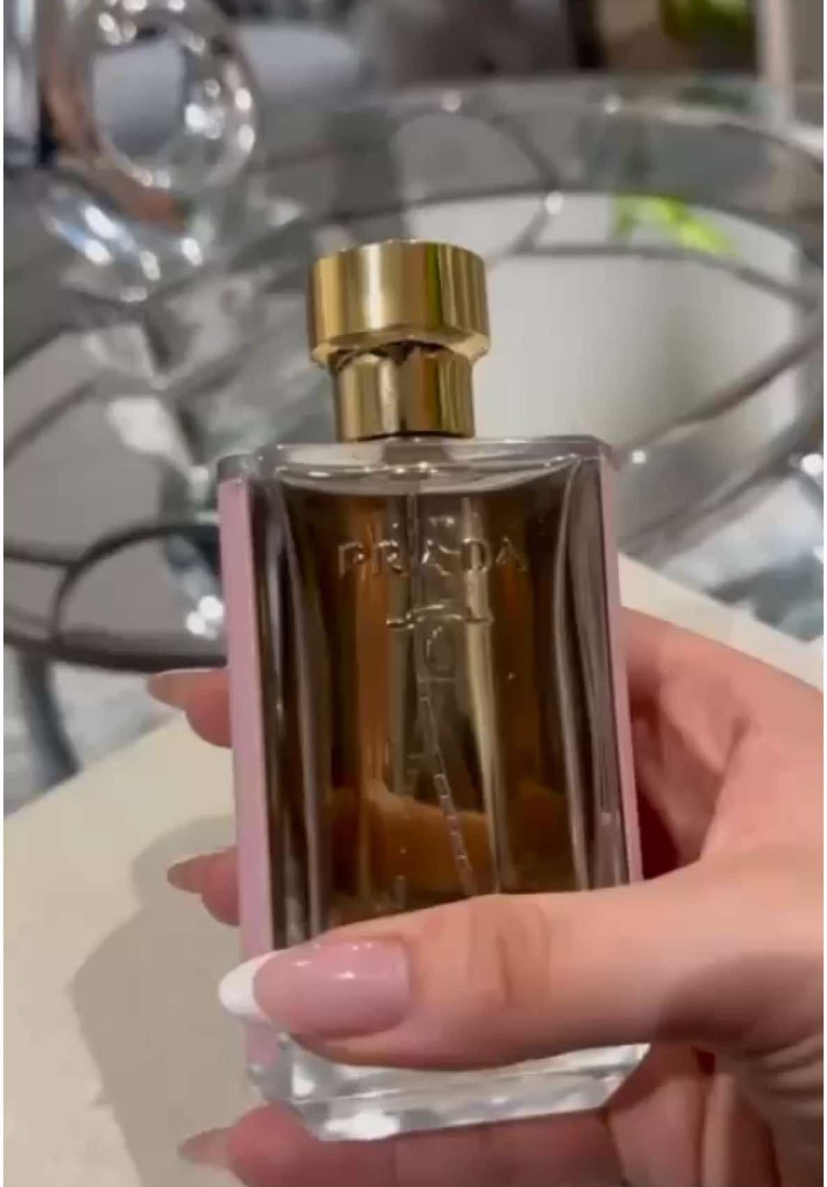 Prada La Femme L’Eau – A Soft, Feminine Bloom.  A delicate and refreshing floral that opens with sparkling mandarin essence and frangipani, flows into a heart of creamy ylang-ylang and tuberose, and dries down to soft woody notes. @Prada  Perfect for spring days and elegant moments — light, luminous, and unmistakably Prada. 	•	Top Notes: 	•	Mandarin essence 	•	Frangipani 	•	Heart (Middle) Notes: 	•	Ylang-ylang 	•	Tuberose 	•	Base Notes: 	•	Woody notes It’s a lighter, fresher take on the original La Femme — perfect for daytime wear or when you want something soft, floral, and elegant without being overpowering #PradaLaFemme #PradaPerfume #LuxuryFragrance #PerfumeTok #FragranceReview #PerfumeLovers #ScentOfTheDay #FragranceAddict #DesignerPerfume