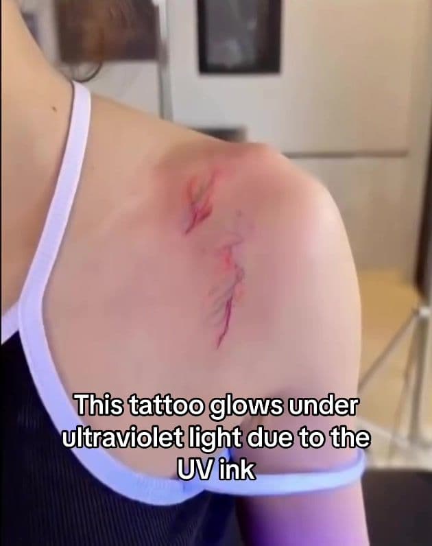UV tattoos glow under ultraviolet light because they are created using special UV-reactive ink that contains fluorescent pigments! These pigments are invisible or faint under normal lighting but react when exposed to UV light, such as from a blacklight. When the tattoo is illuminated by UV rays, the pigments absorb the invisible ultraviolet energy and re-emit it as visible light, causing the tattoo to glow in bright, vivid colors. This makes UV tattoos popular for their hidden, almost invisible look in regular lighting and their striking, luminous appearance in dark or nightlife settings.#tattoo #technology #fyp #blowup 