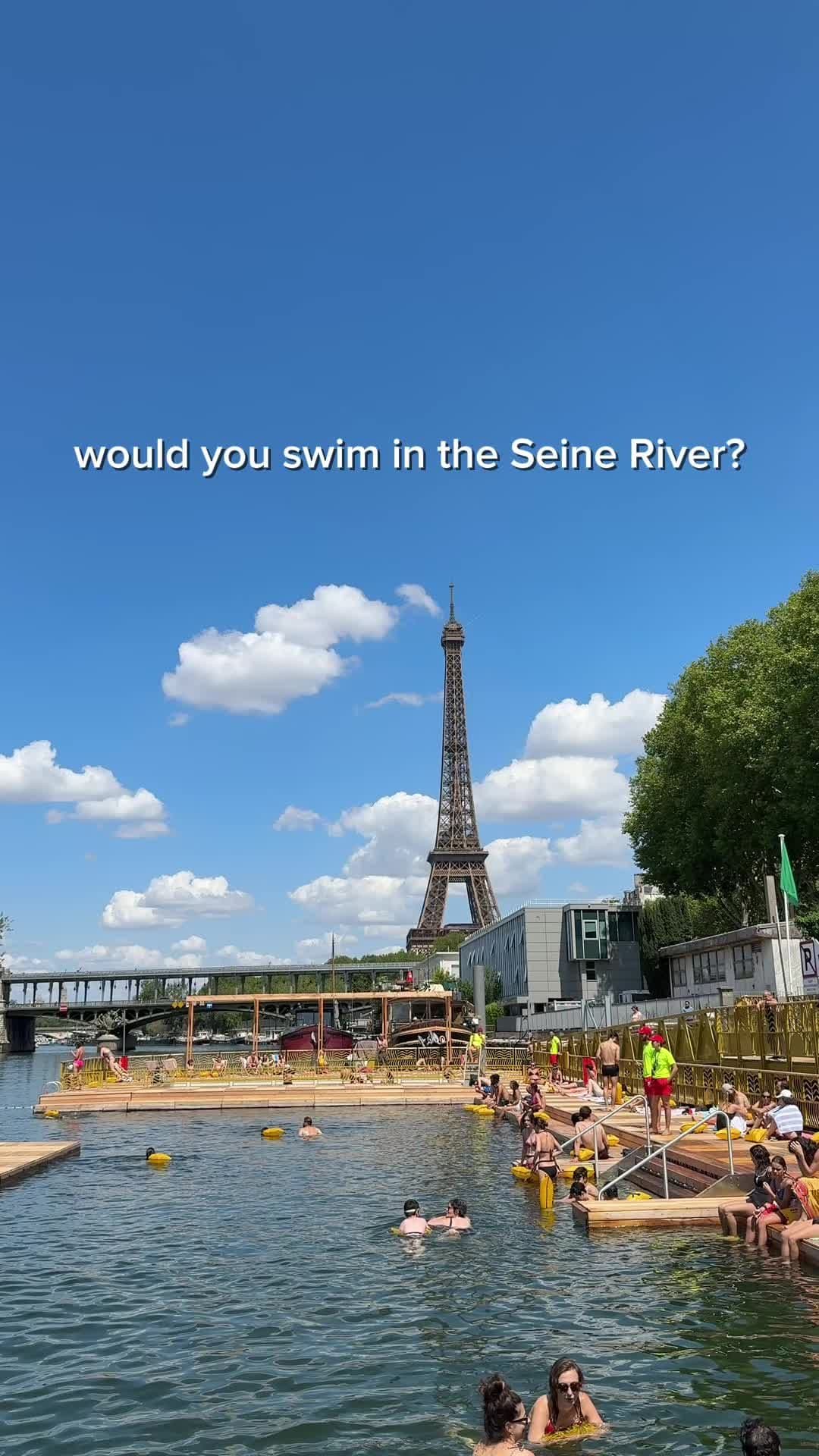 Would you go for a swim in the Seine? For the first time in 100 years, public swimming in the Seine River is back! Paris Plages is back for the summer and honestly, this particular spot (Baignade Grenelle) was really nice.  Although we actually didn't go in LOL (austin can't swim 🥲) You have an amazing view of the Eiffel Tower and the whole setup is well done! Even if you don't want to swim, you can just chill on the side and sunbathe with a view 😎 #parisplages 