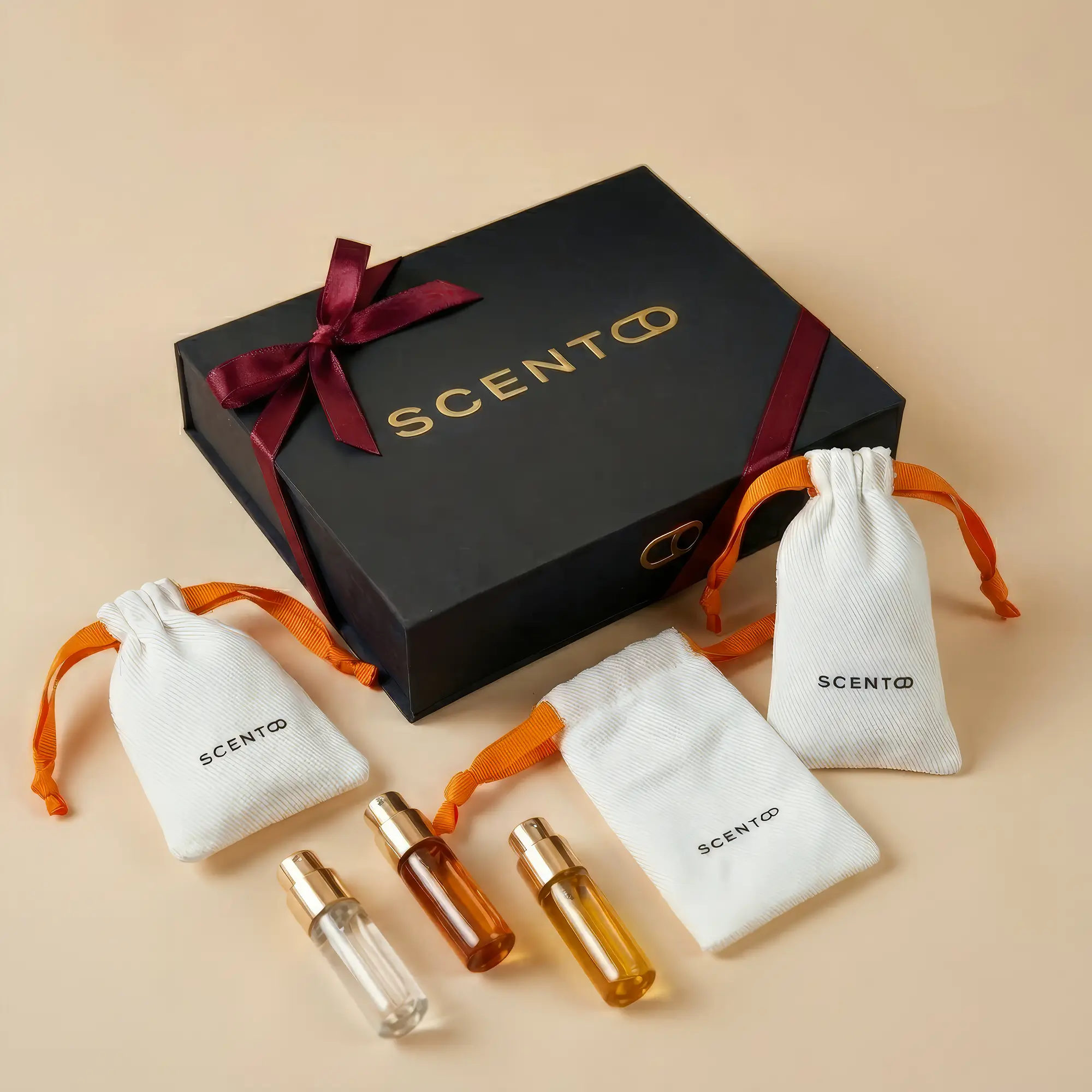 Scento luxury gift box and velvet pouch packaging — premium perfume sample presentation
